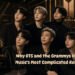Seven-member K-pop group beside a Grammy trophy on an awards stage